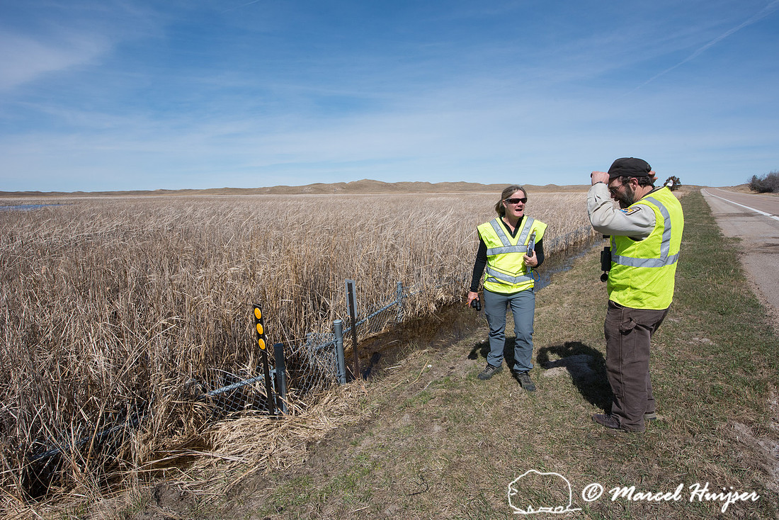 Kari Gunson and Mel Nenneman inspect fences and culverts for Bla