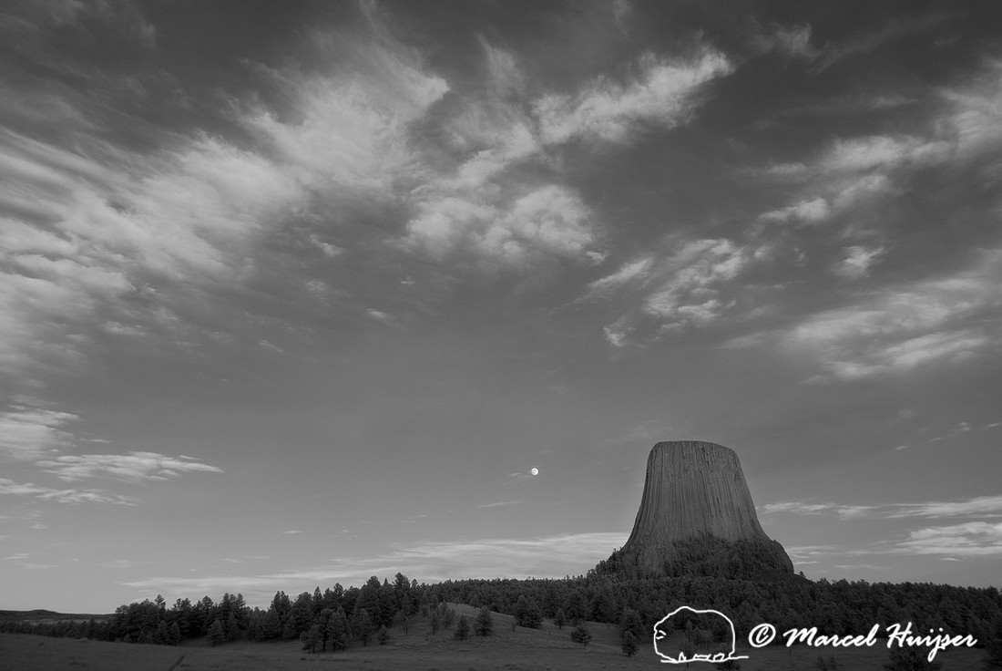 Devils Tower National Monument with moon, in infrared, Wyoming,