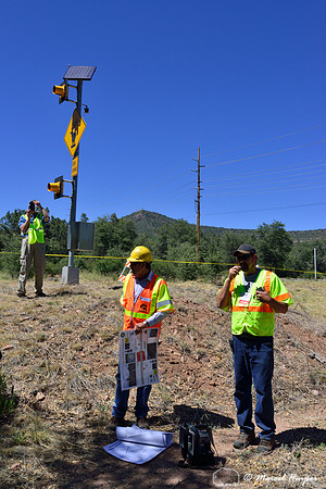 Norris Dodd and Jeff Gagnon address participants ICOET excursion at animal detection system, S.R. 260, east of Payson, Arizona, USA