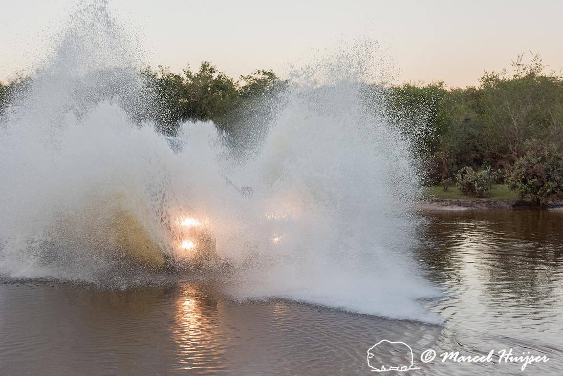 Crossing a stream, Mitsubishi 4x4, L200 Triton Savana, on wildli