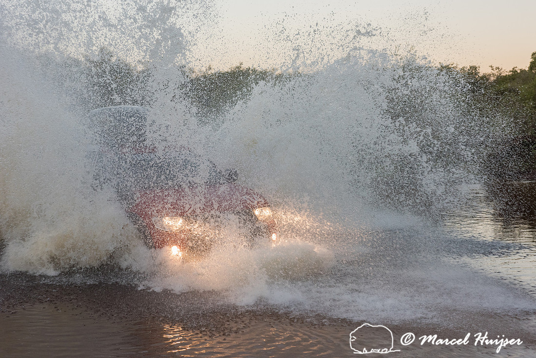 Crossing a stream, Mitsubishi 4x4, L200 Triton Savana, on wildli