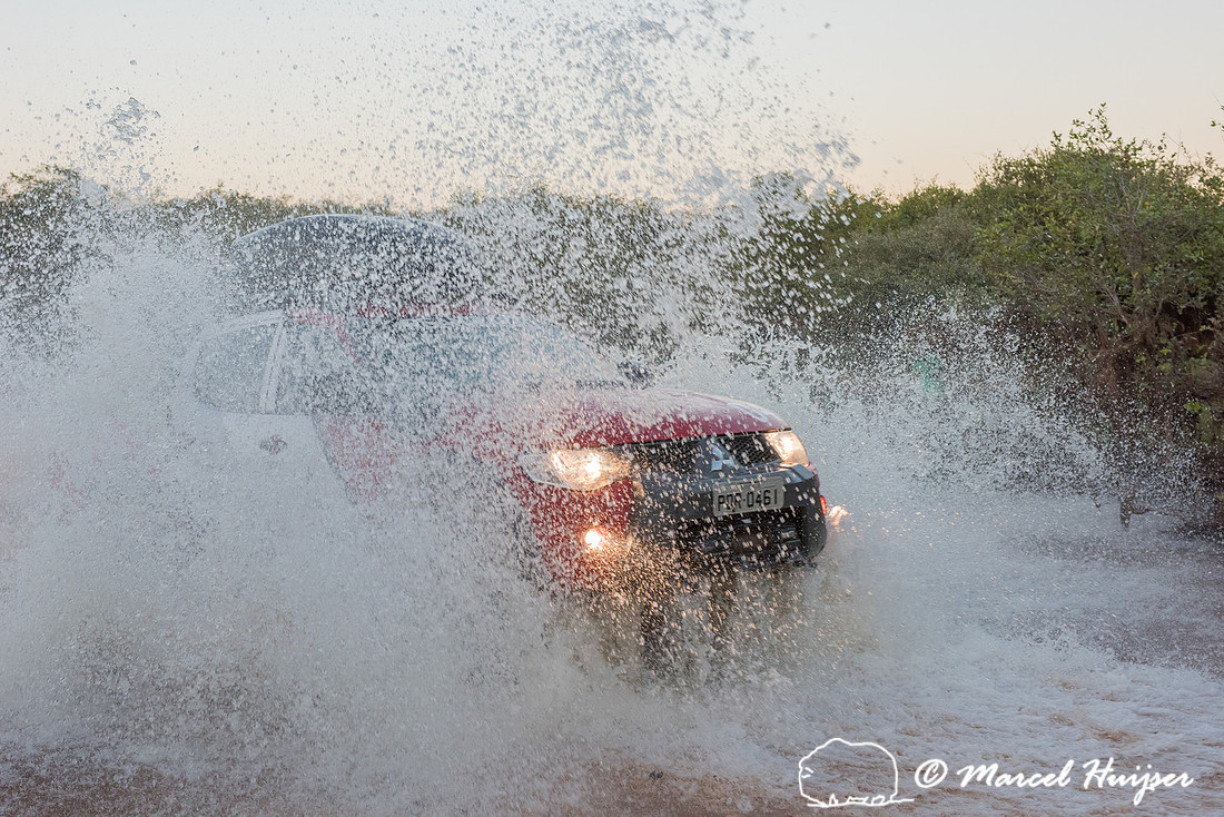 Crossing a stream, Mitsubishi 4x4, L200 Triton Savana, on wildli