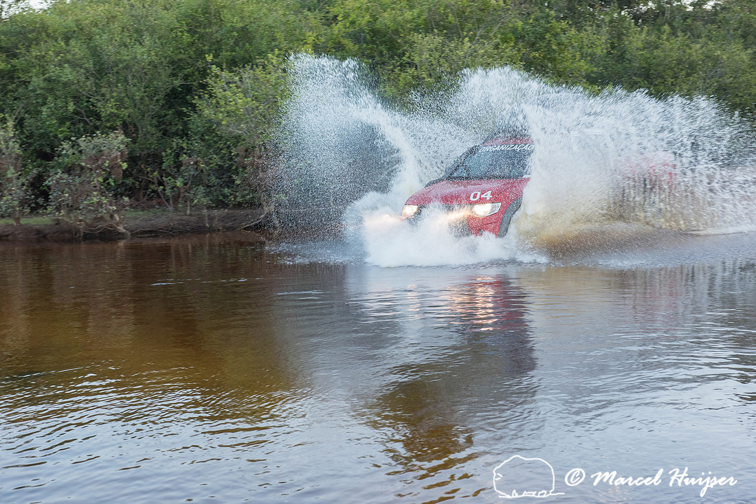 Crossing a stream, Mitsubishi 4x4, L200 Triton Savana, on wildli