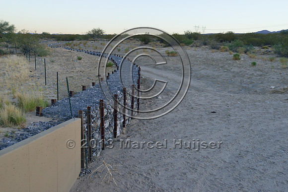 Approach of gabion wall to culvert to protect against erosion from flashfloods, Arizona, USA