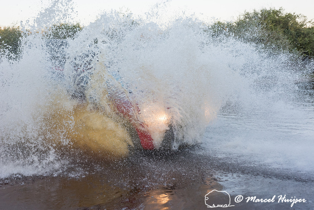 Crossing a stream, Mitsubishi 4x4, L200 Triton Savana, on wildli