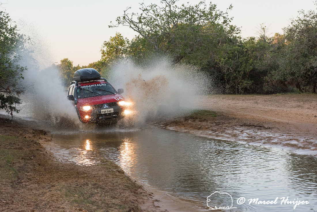 Crossing a stream, Mitsubishi 4x4, L200 Triton Savana, on wildli