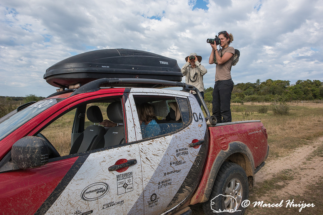 Bethanie Walder and Fernanda Abra look for wildlife with the Mit