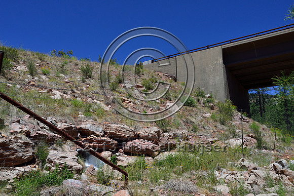 Retaining wall to allow for a wider flat area at wildlife underpass, Arizona, USA.