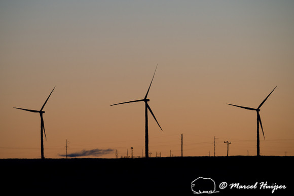 Wind turbines at sunrise on the great plains, Montana, USA