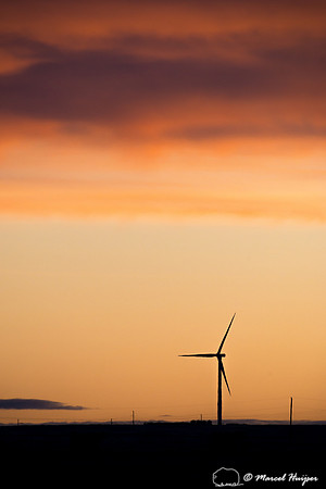 Wind turbines at sunrise on the great plains, Montana, USA