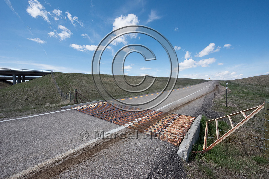 Cattle guard at on ramp at Reno road interchange along I-25, mil