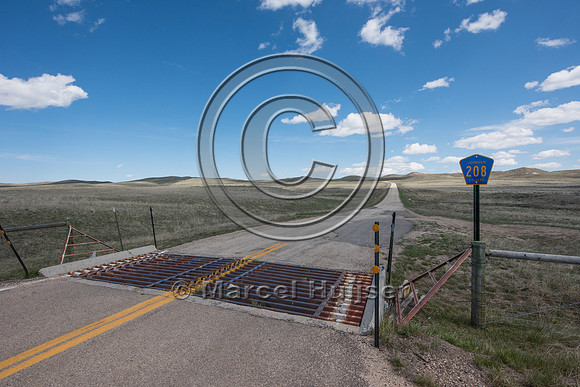 Cattle guard at  Reno road interchange along I-25, mile 265.48),