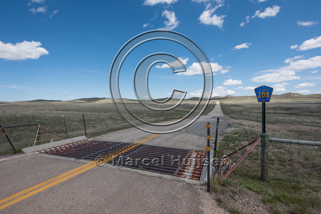 Cattle guard at Reno road interchange along I-25, mile 265.48),