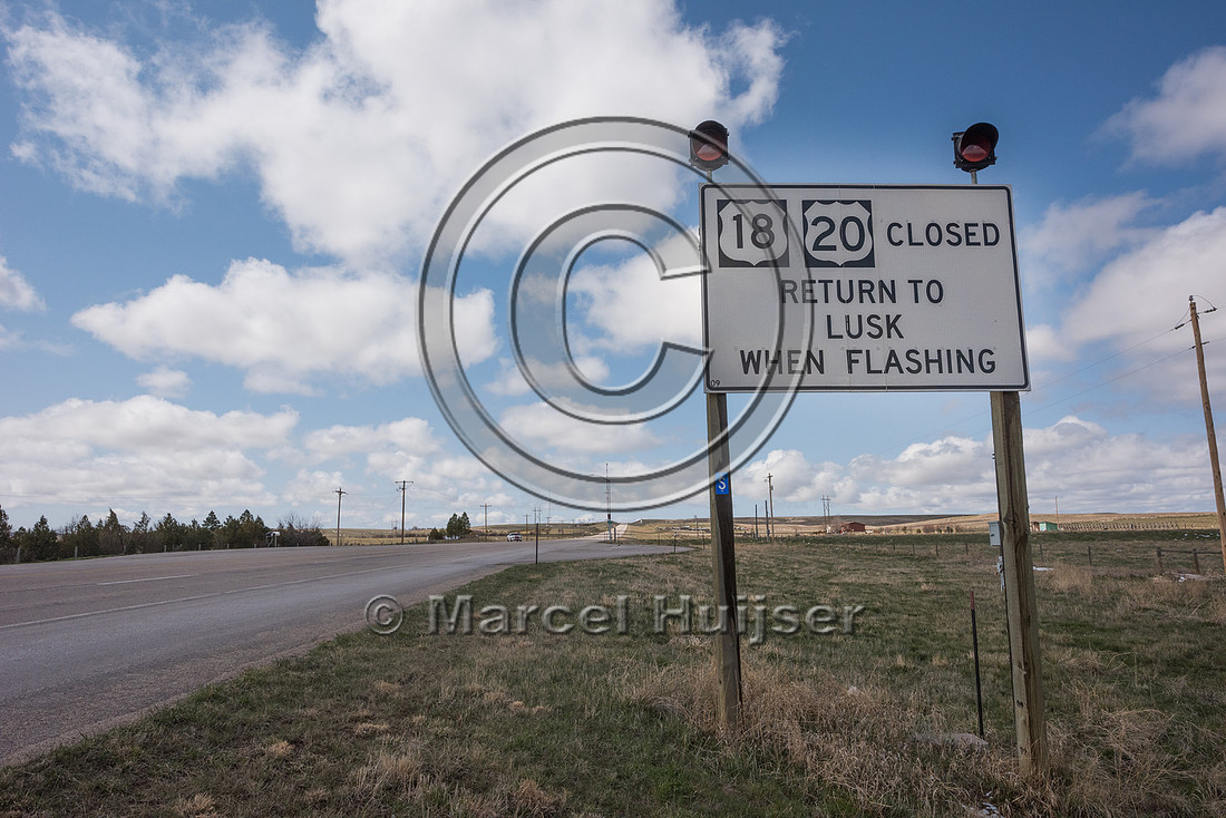 Sign, road closed (snow storm, snow drifts, Lusk, Wyoming