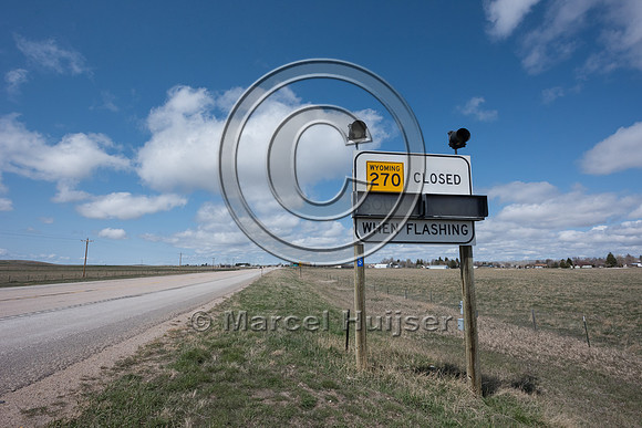 Sign, road closed (snow storm, snow drifts, Lusk, Wyoming