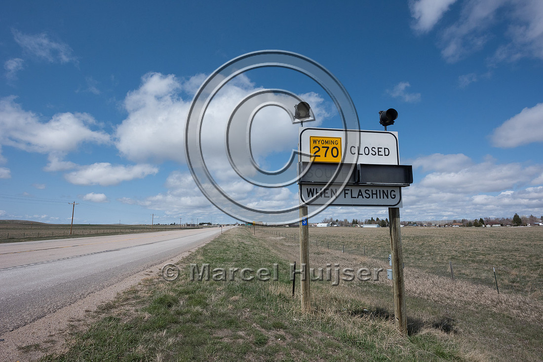 Sign, road closed (snow storm, snow drifts, Lusk, Wyoming