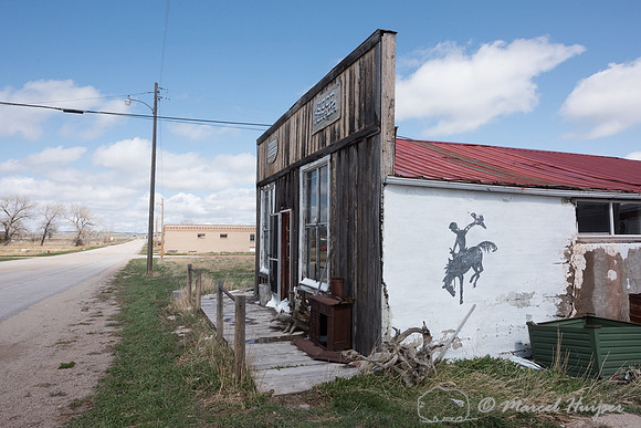 Bucking horse and rider logo, mural in a small town, Wyoming, US