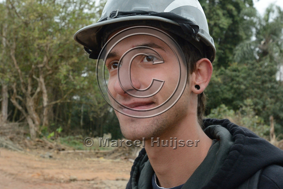 Lucas Borges Barbosa one of the people who catch and remove animals and plants from the path of the new motorway Rodoanel Norte, Greater São Paulo, Brazil