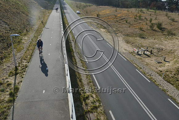 View on road and bicycle path from top of wildlife overpass Oud Reemst (about 35 m wide), south of Otterlo, The Netherlands
