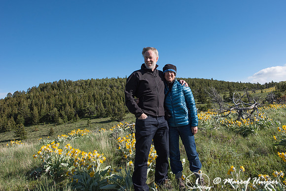 Marcel Huijser and Bethanie Walder in field with arrowleaf balsa