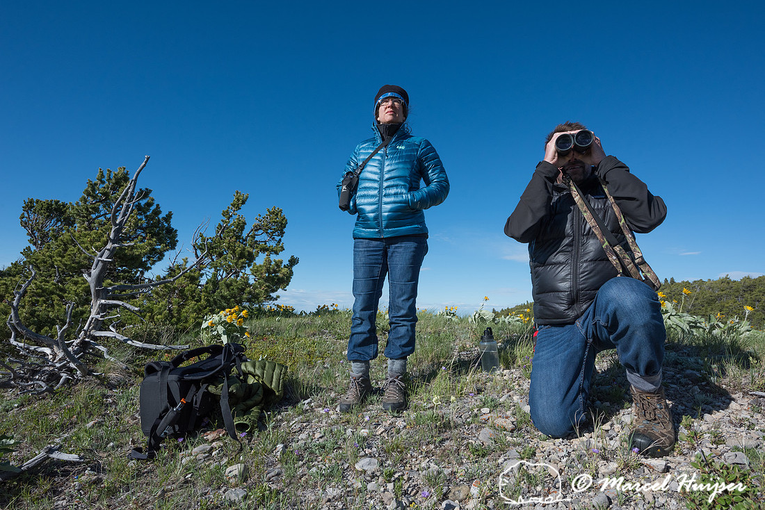 Bethanie Walder and Andrew Jakes looking for wildlife, Montana,