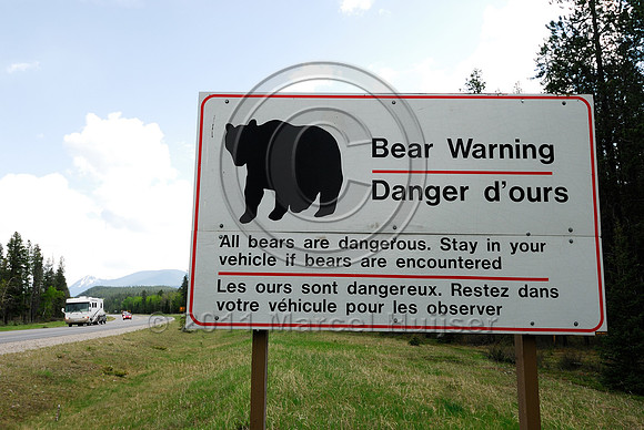Wildlife warning sign, Bear warning All bears are dangerous Stay in vehicle if bears are encountered, AB