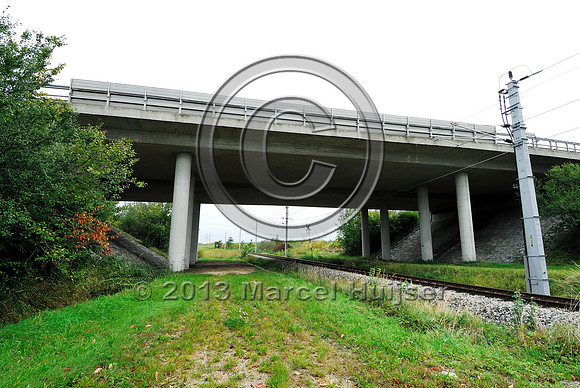 Railroad and farm road at multifunctional underpass, under A4 motorway, Parndorf, Austria