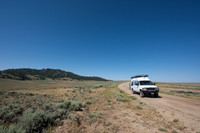 Our camper van on dirt road, Wind River Range,  Wyoming, USA