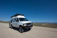 Our camper van on dirt road, Wind River Range,  Wyoming, USA