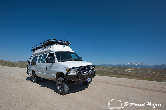 Our camper van on dirt road, Wind River Range,  Wyoming, USA