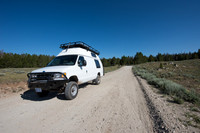 Our camper van on dirt road, Wind River Range,  Wyoming, USA