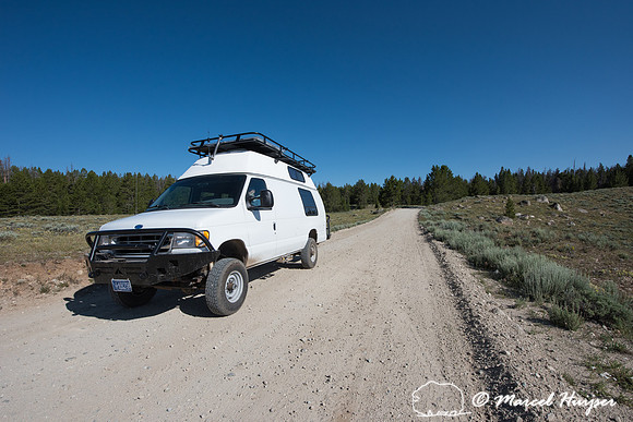 Our camper van on dirt road, Wind River Range,  Wyoming, USA