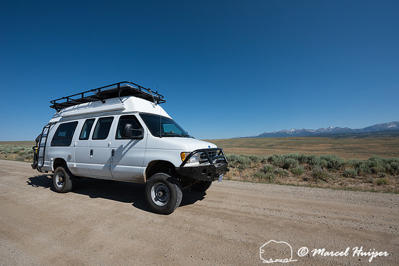 Our camper van on dirt road, Wind River Range,  Wyoming, USA