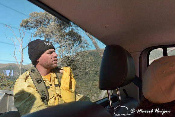 Fire fighter hitching a ride to a fire with the Volkswagen Amarok from Adventure Camp, Parque Nacional da Serra da Bocaina, São Paulo, Brazil