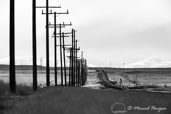 Old railroad tracks and power lines, Freezout Lake Wildlife Mana
