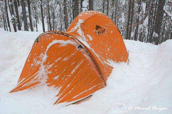 Tent in snow, Chief Joseph Pass, Montana, USA