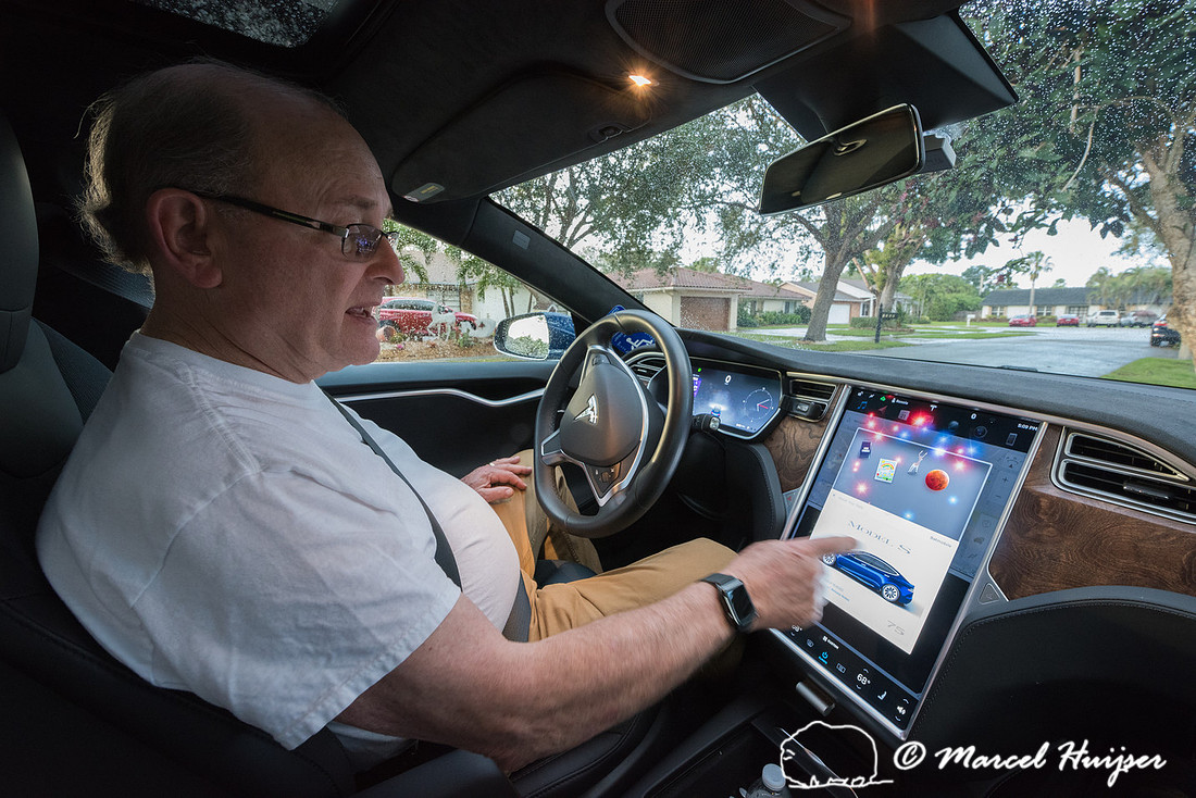 Ronald Blank in his Tesla Model S, Ft Lauderdale, Florida, USA