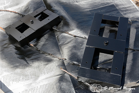 Marcel Huijser makes custom brackets for sensors that detect wildlife and that hook up to his cameras