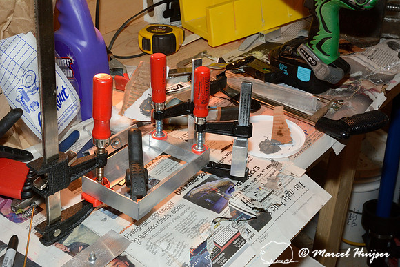 Marcel Huijser makes custom brackets for sensors that detect wildlife and that hook up to his cameras