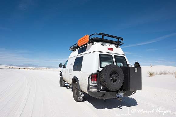Camper van 4x4 on dirt road, White Sands National Monument, New