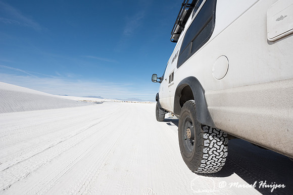 Camper van 4x4 on dirt road, White Sands National Monument, New