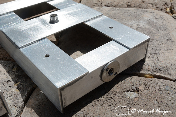 Marcel Huijser makes custom brackets for sensors that detect wildlife and that hook up to his cameras