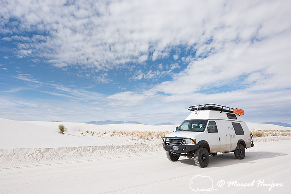 Camper van 4x4 on dirt road, White Sands National Monument, New