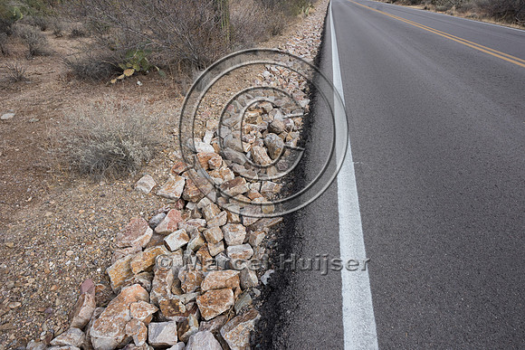 Rock lined drainage along a slope to reduce erosion, Saguaro Nat