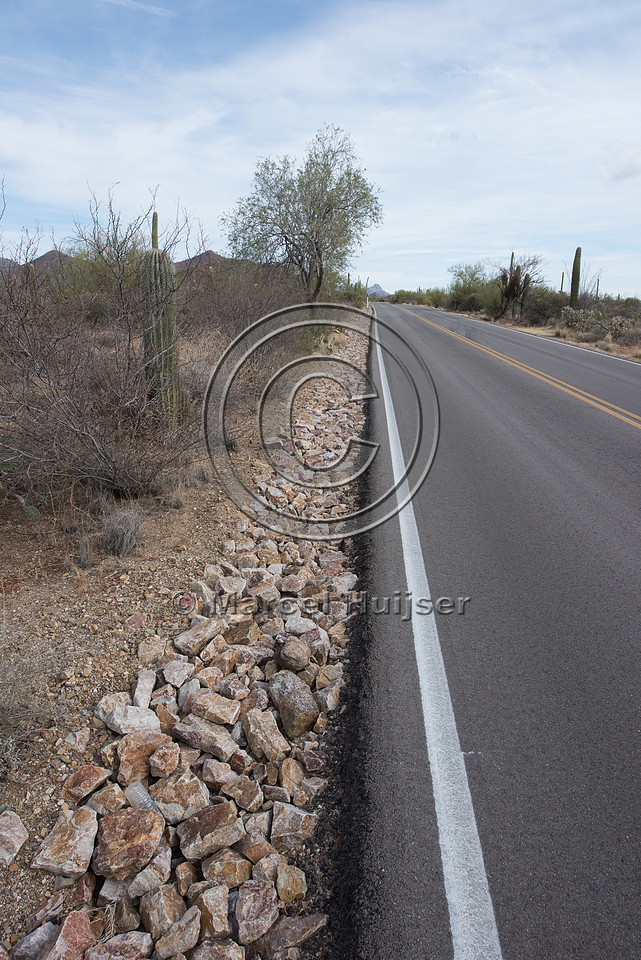 Rock lined drainage along a slope to reduce erosion, Saguaro Nat