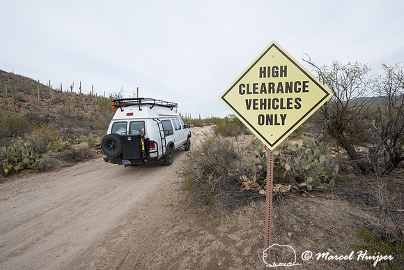 Camper van on dirt road, Saguaro National Park, Arizona, USA
