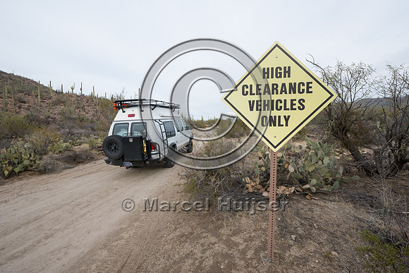 Camper van on dirt road, Saguaro National Park, Arizona, USA