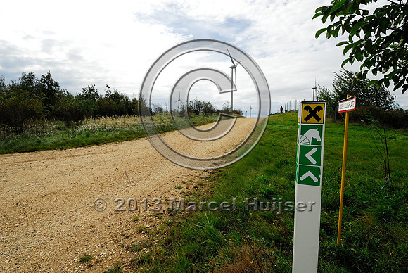 Trail sign for horseback riders on top of multifunctional overpass (farm road and wildlife, about 100 m wide), across A4 motorway, Parndorf, Austria