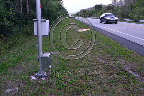 Vegetation is kept short in between sensors animal detection system, Tamiami Trail, US Hwy 41, Florida, USA