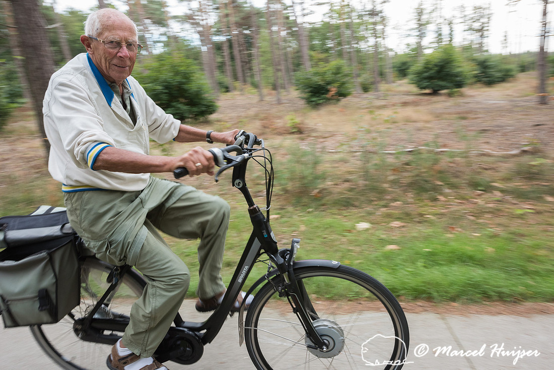 Piet Huijser on his bicycle, Soest, The Netherlands